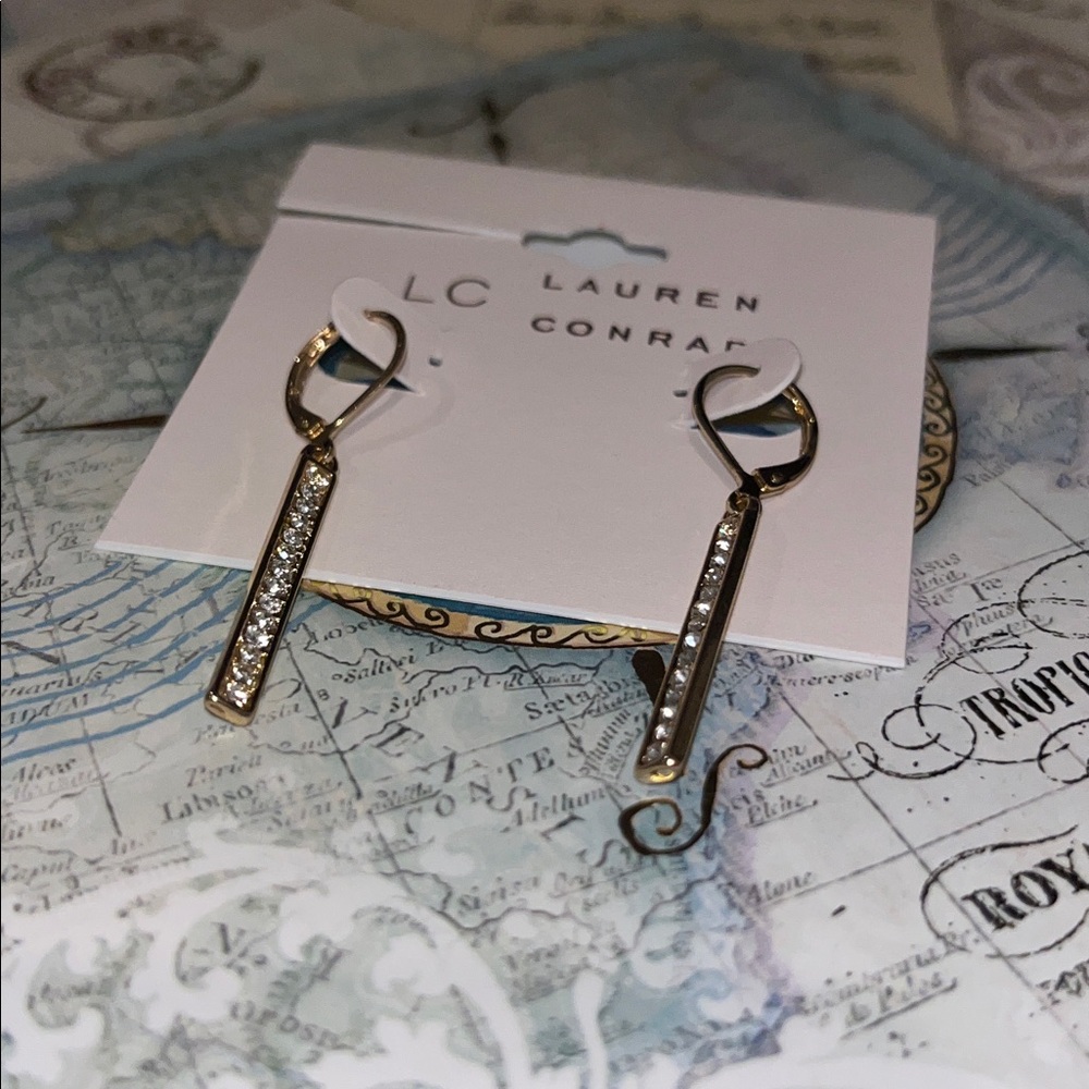 LC gold-tone dangle earrings with a bar of cubic zirconia or rhinestone accents